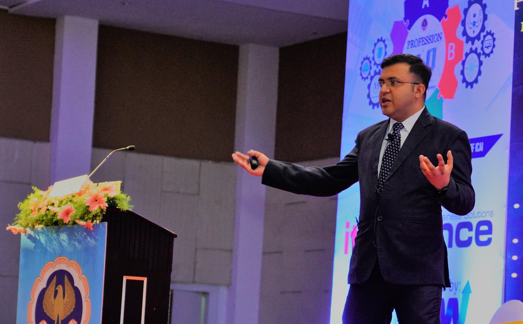Gaurav Sangtani speaking on stage
